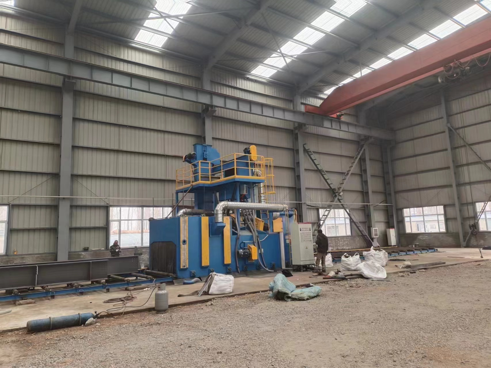 What are the characteristics of the steel structure shot blasting machine produced by our company